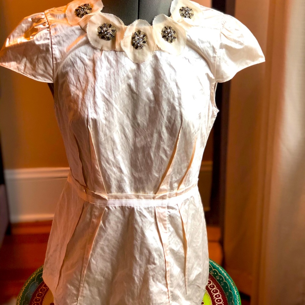 BCBG Blouse with appliqué beaded flowers size S